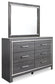 Lodanna King Panel Bed with 2 Storage Drawers with Mirrored Dresser, Chest and Nightstand