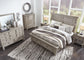Harrastone King Panel Bed with Mirrored Dresser, Chest and 2 Nightstands